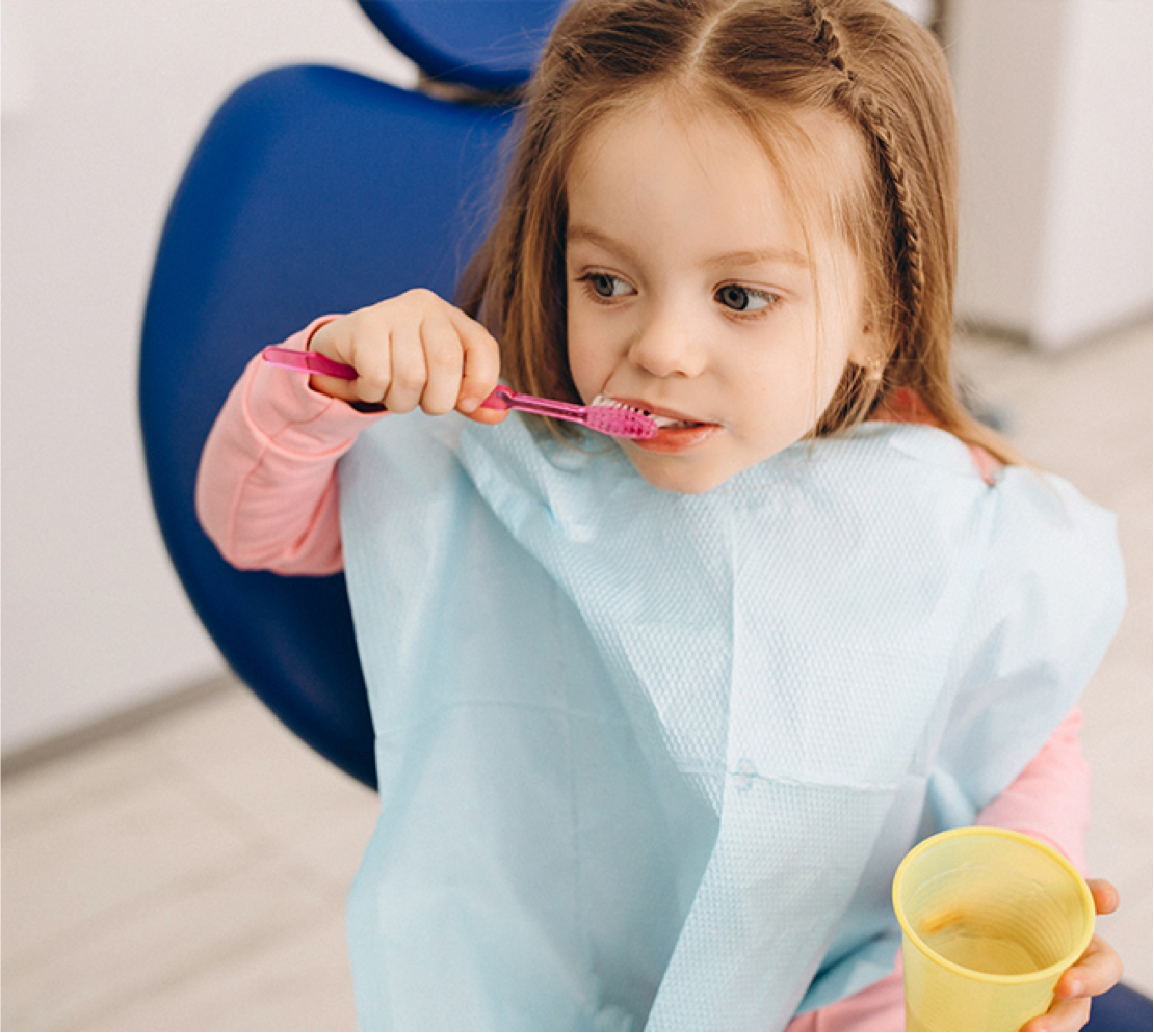 Niña en el dentista